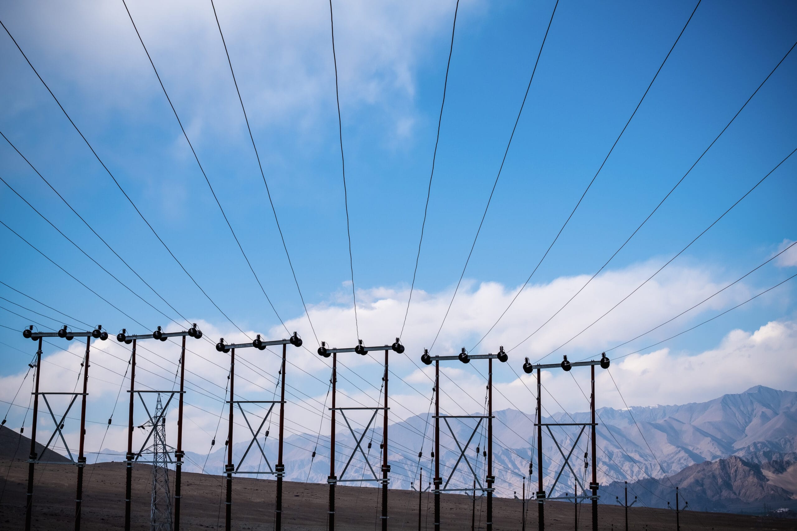 Electric poles and cables with blue sky background in Ladakh city , India